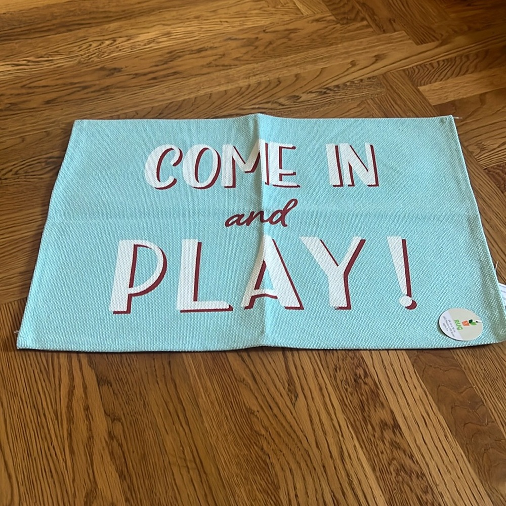 Come  in and play rug 24 x 16 new with tags